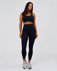 Woman wearing Elite Run High-Rise Full Length Legging Pockets - Black | Model:Bianca | Size:S | Thumbnail Index: 8