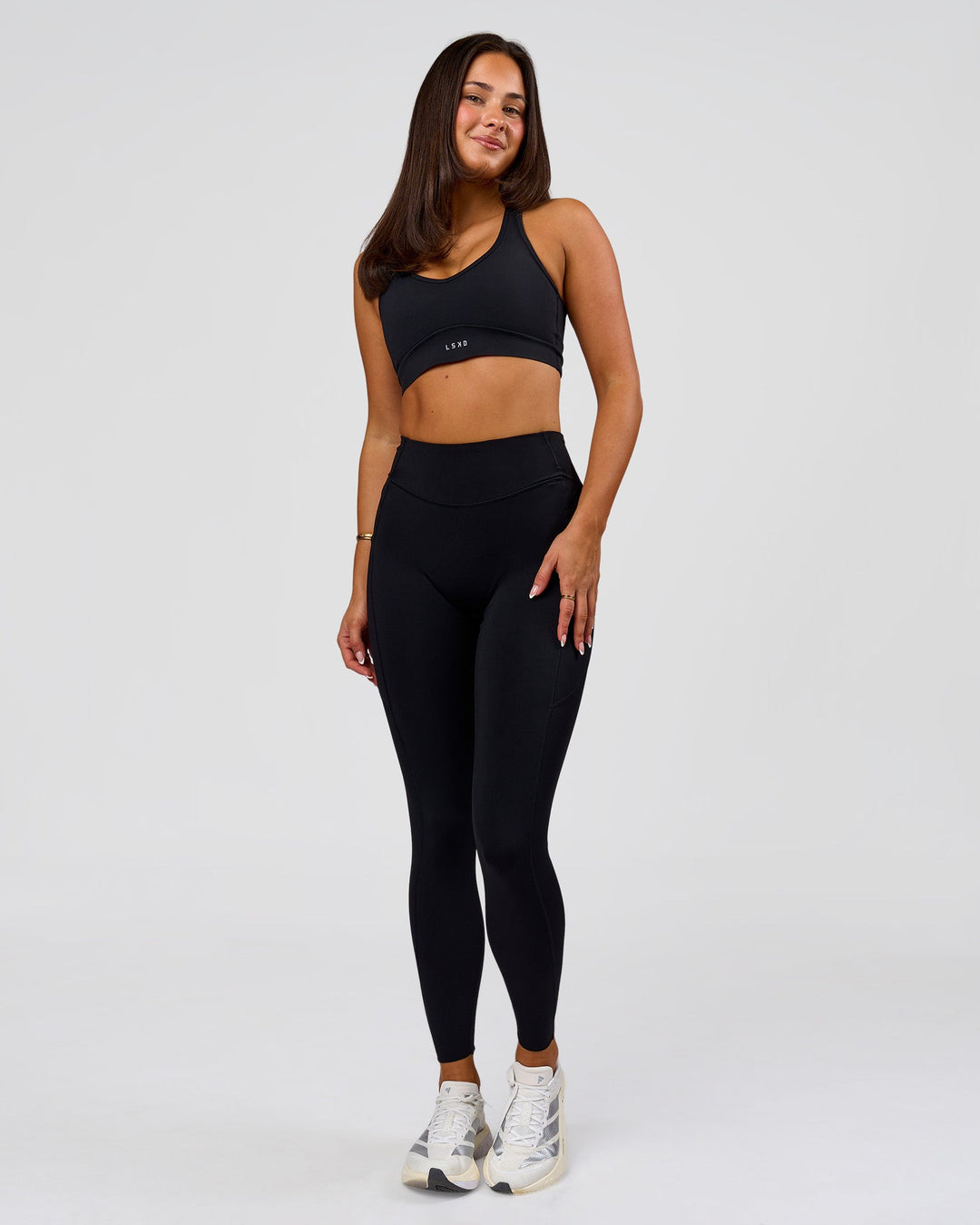Woman wearing Elite Run High-Rise Full Length Legging Pockets - Black | Model:Bianca | Size:S - view 11
