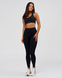 Woman wearing Elite Run High-Rise Full Length Legging Pockets - Black | Model:Bianca | Size:S | Thumbnail Index: 10