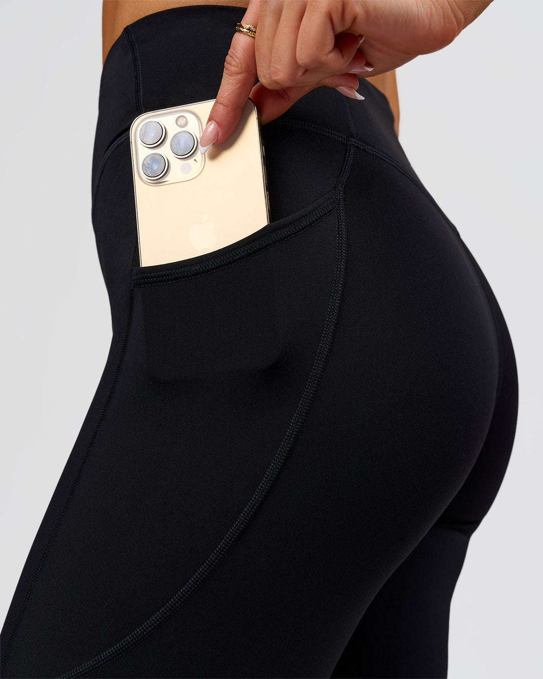 Woman wearing Elite Run High-Rise Full Length Legging Pockets - Black | Model:Bianca | Size:S - view 3