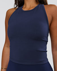Woman wearing Flow Performance Shelf Bra Tank 2.0 - Future Navy | Model:Bianca | Size:S | Thumbnail Index: 2