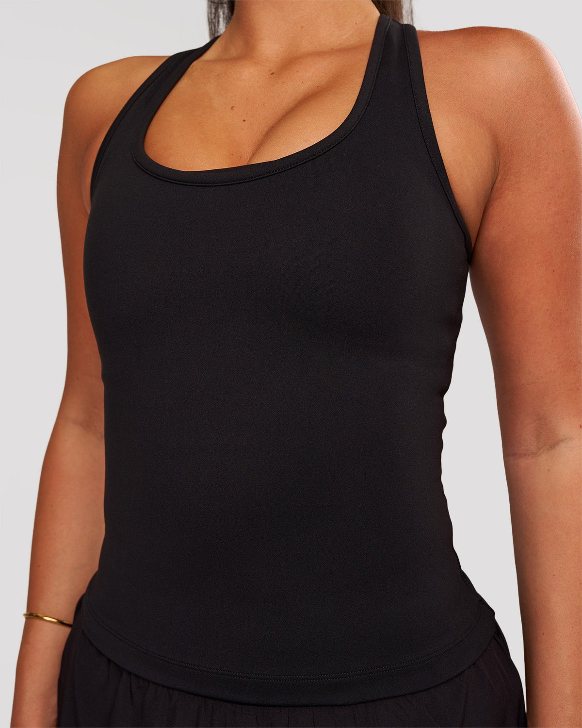 Woman wearing Flow Rep Scoop Neck Tank - Black | Model:Bianca | Size:S