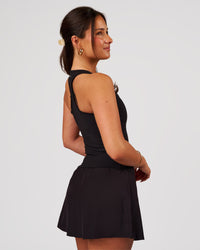 Woman wearing Flow Rep Scoop Neck Tank - Black | Model:Bianca | Size:S | Thumbnail Index: 2