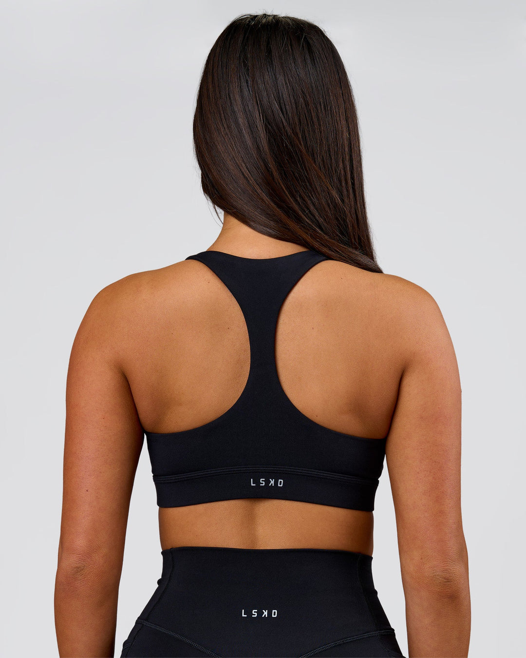 Woman wearing Flow Sports Bra - Black | Model:Bianca | Size:S - view 6