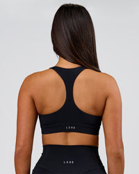 Woman wearing Flow Sports Bra - Black | Model:Bianca | Size:S | Thumbnail Index: 5