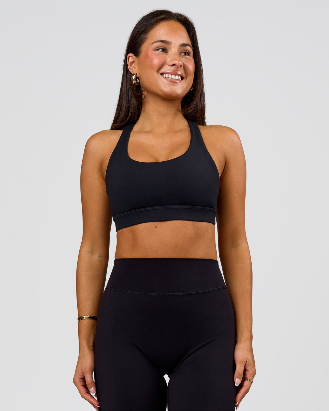Woman wearing Flow Sports Bra - Black | Model:Bianca | Size:S - view 4