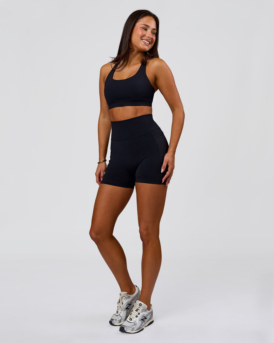 Woman wearing Flow Sports Bra - Black | Model:Bianca | Size:S - view 5