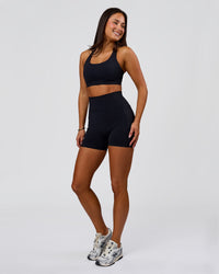 Woman wearing Flow Sports Bra - Black | Model:Bianca | Size:S | Thumbnail Index: 4