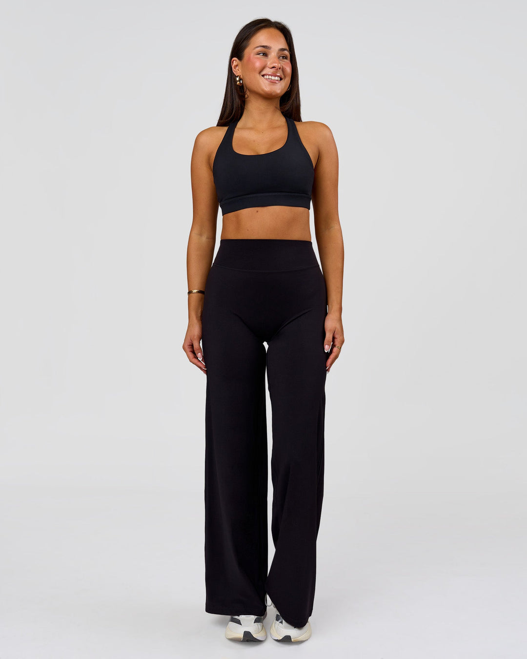 Woman wearing Flow Sports Bra - Black | Model:Bianca | Size:S - view 7