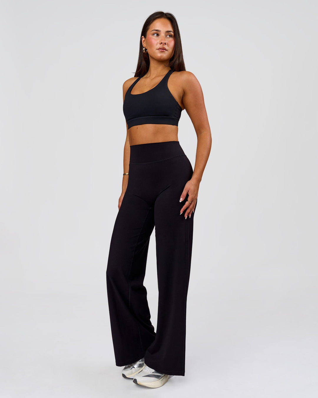 Woman wearing Flow Sports Bra - Black | Model:Bianca | Size:S - view 8