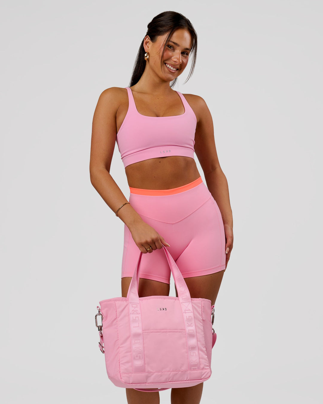 Woman wearing Fusion Contrast V-Waist High-Rise 4" Short Pockets - Pink Rose-Hyper Orange | Model:Bianca | Size:S - view 13