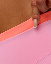 Woman wearing Fusion Contrast V-Waist High-Rise 4" Short Pockets - Pink Rose-Hyper Orange | Model:Bianca | Size:S | Thumbnail Index: 8