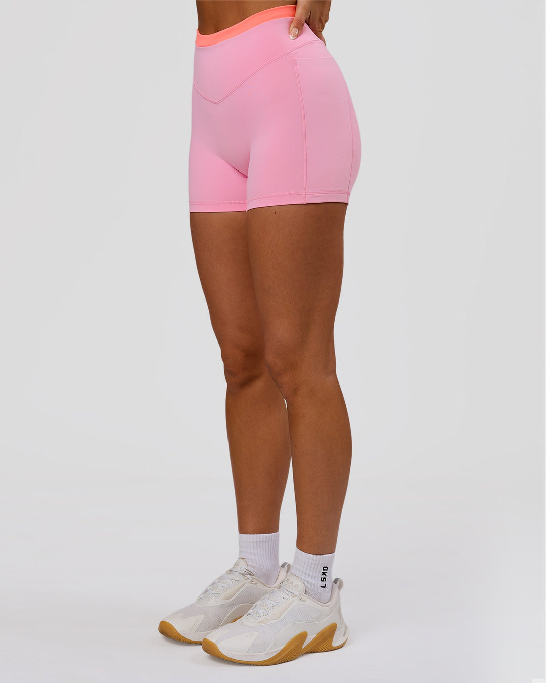 Woman wearing Fusion Contrast V-Waist High-Rise 4" Short Pockets - Pink Rose-Hyper Orange | Model:Bianca | Size:S - view 10