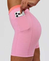 Woman wearing Fusion Contrast V-Waist High-Rise 6" Short Pockets - Pink Rose-Hyper Orange | Model:Bianca | Size:S | Thumbnail Index: 2