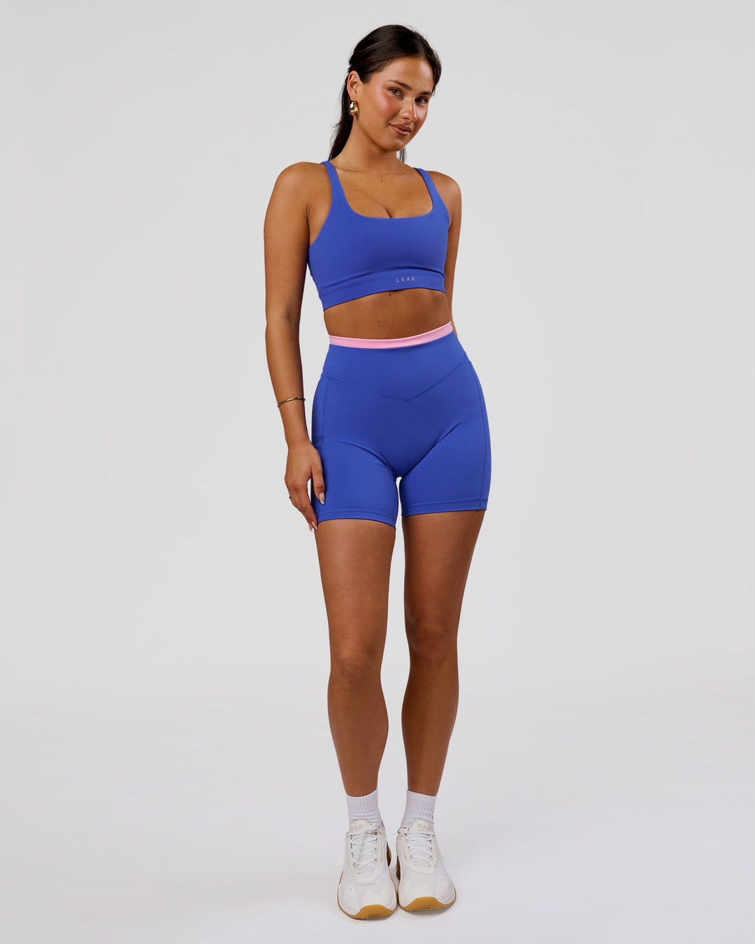 Woman wearing Fusion Contrast V-Waist High-Rise 6" Short Pockets - Power Cobalt-Pink Rose | Model:Bianca | Size:S - view 7