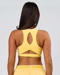 Woman wearing Fusion Sports Bra 2.0 - Lemon | Model:Bianca | Size:S | Thumbnail Index: 2