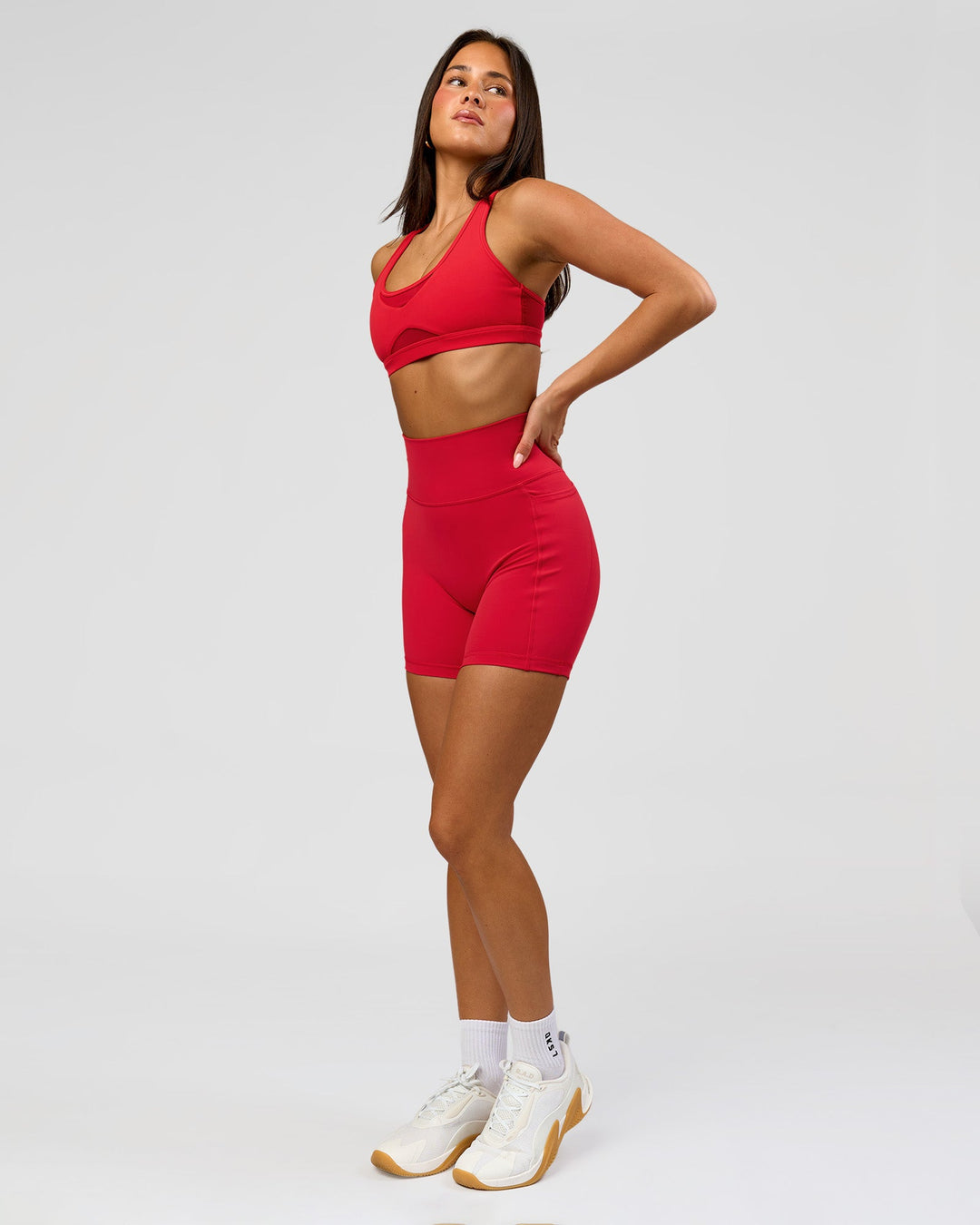 Woman wearing Fusion Ultra High-Rise 6" Short Pockets - Scarlet | Model:Bianca | Size:S - view 4