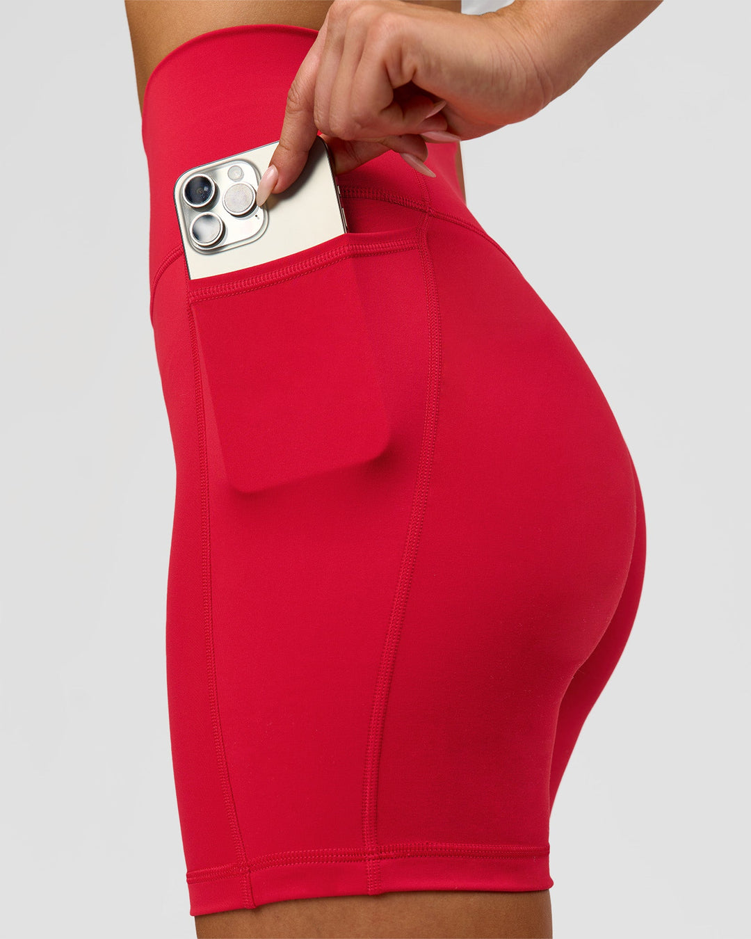 Woman wearing Fusion Ultra High-Rise 6" Short Pockets - Scarlet | Model:Bianca | Size:S - view 5