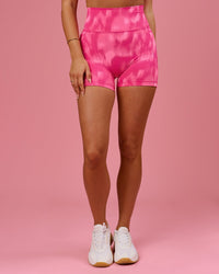 Woman wearing Fusion V-Contour Ultra High-Rise 4” Short Pockets - Radiant Pink | Model:Bianca | Size:S | Thumbnail Index: 2