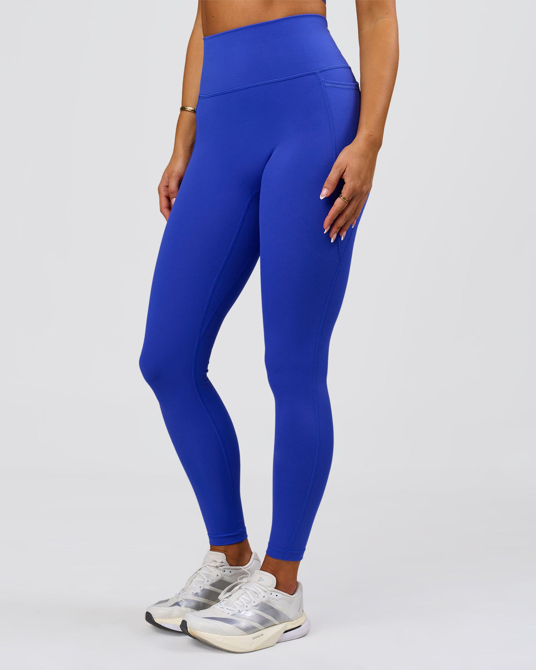 Woman wearing Fusion V-Contour Ultra High-Rise Full Length Legging Pockets - Power Cobalt | Model:Bianca | Size:S - view 2