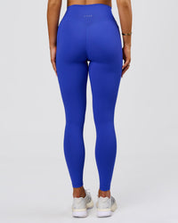 Woman wearing Fusion V-Contour Ultra High-Rise Full Length Legging Pockets - Power Cobalt | Model:Bianca | Size:S | Thumbnail Index: 0