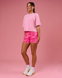 Woman wearing Go-To Heavyweight FLXCotton Graphic Skimmer Tee - Pink Rose-We Rise | Model:Bianca | Size:S | Thumbnail Index: 8