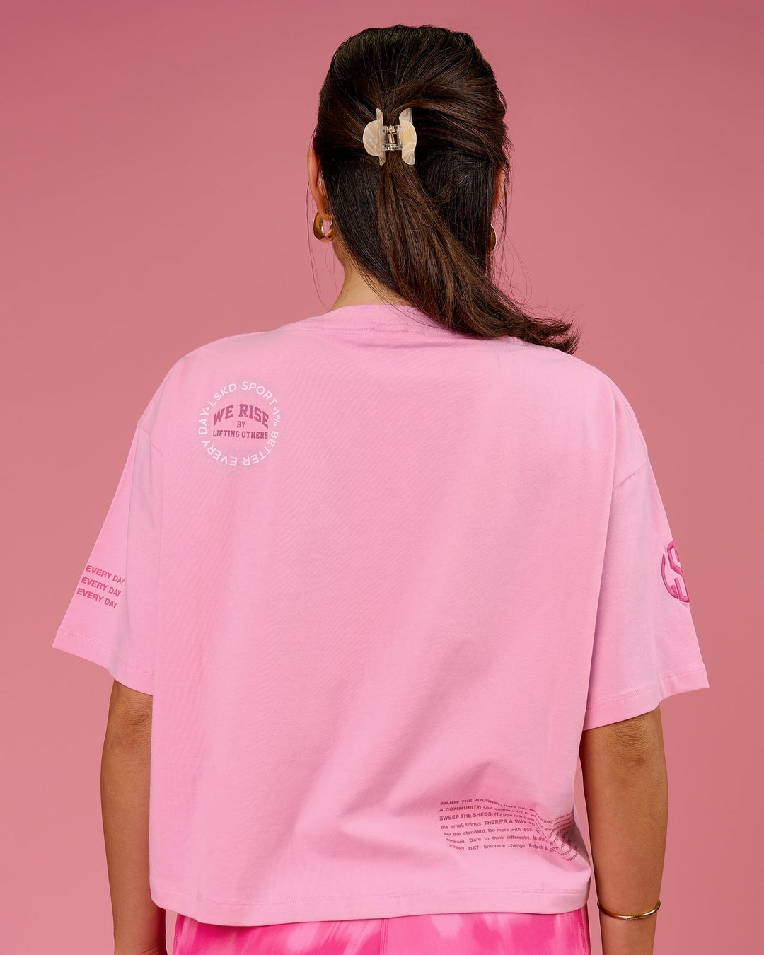 Woman wearing Go-To Heavyweight FLXCotton Graphic Skimmer Tee - Pink Rose-We Rise | Model:Bianca | Size:S - view 10