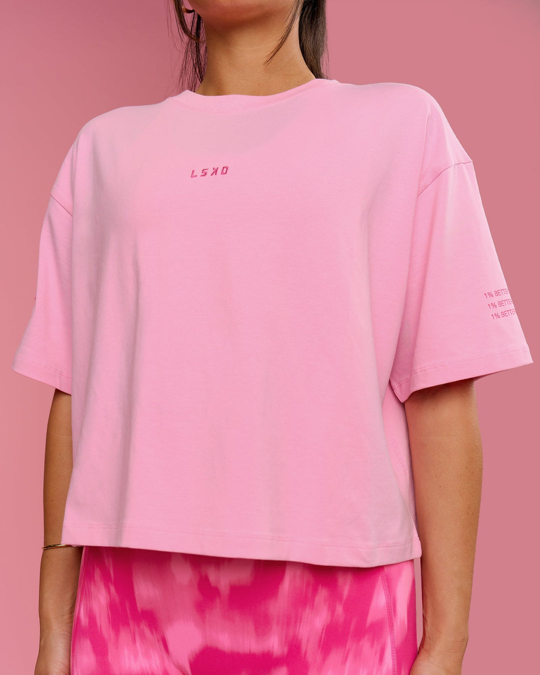 Woman wearing Go-To Heavyweight FLXCotton Graphic Skimmer Tee - Pink Rose-We Rise | Model:Bianca | Size:S - view 14