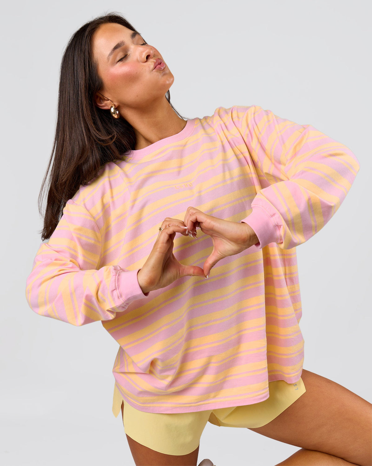 Woman wearing Go-To Shadow Stripe Long Sleeve FLXCotton Oversized Tee - Lemon-Marshmallow | Model:Bianca | Size:S - view 1