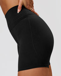 Woman wearing Luxe V-Contour High-Rise 6" Short - Black | Model:Bianca | Size:S | Thumbnail Index: 3
