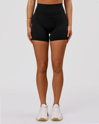 Woman wearing Luxe V-Contour High-Rise 6" Short - Black | Model:Bianca | Size:S | Thumbnail Index: 7
