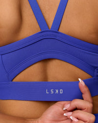 Woman wearing Momentum Sports Bra D/DD/E - Power Cobalt | Model:Bianca | Size:S | Thumbnail Index: 3