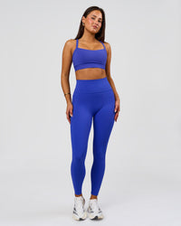 Woman wearing Momentum Sports Bra D/DD/E - Power Cobalt | Model:Bianca | Size:S | Thumbnail Index: 6