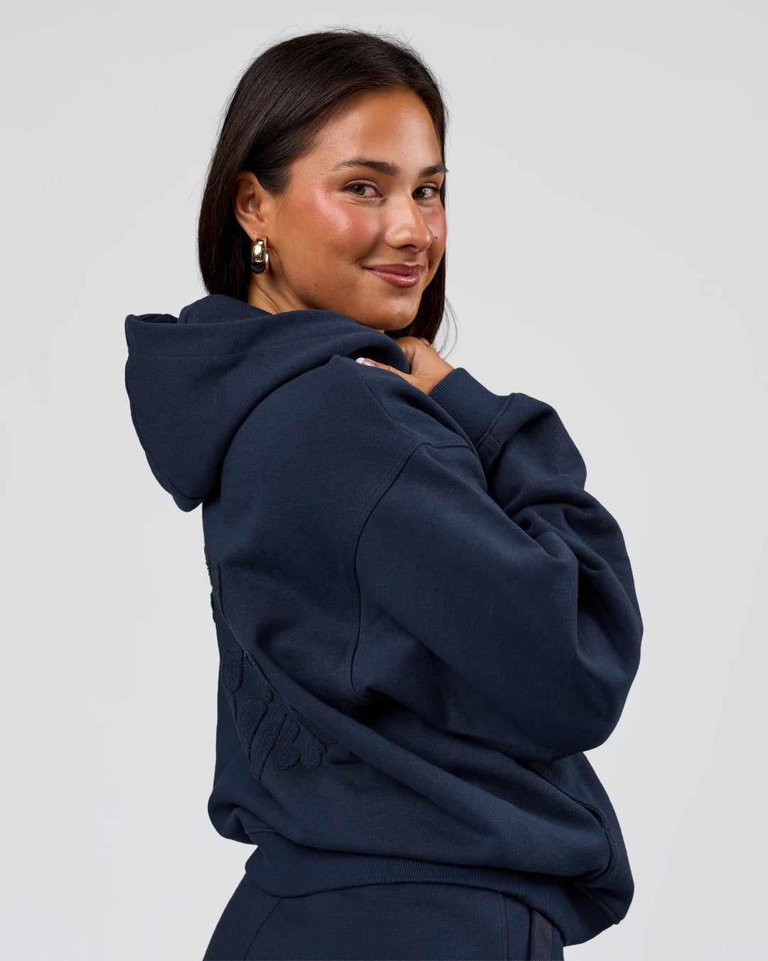 Woman wearing MVP Elite French Terry Hoodie - Future Navy | Model:Bianca | Size:S - view 3