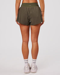 Woman wearing Pacer 3" Run Short - Pure Olive | Model:Bianca | Size:S | Thumbnail Index: 5