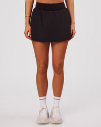 Woman wearing Pacer Skirt - Black | Model:Bianca | Size:S | Thumbnail Index: 6