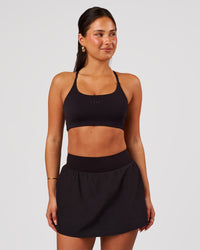 Woman wearing Pacer Skirt - Black | Model:Bianca | Size:S | Thumbnail Index: 1