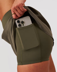 Woman wearing Pacer Skirt - Pure Olive | Model:Bianca | Size:S | Thumbnail Index: 2