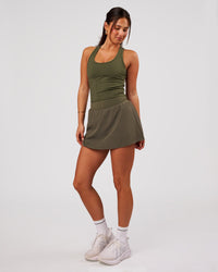 Woman wearing Pacer Skirt - Pure Olive | Model:Bianca | Size:S | Thumbnail Index: 3