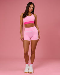 Woman wearing Pinnacle High-Rise 4" Short - Pink Rose-White | Model:Bianca | Size:S | Thumbnail Index: 5