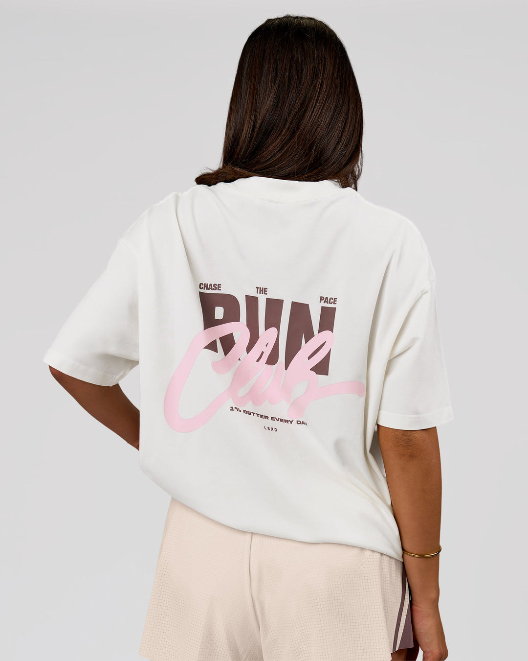 Woman wearing Run Club Unisex Oversized Heavyweight FLXCotton Tee - Off White | Model:Bianca | Size:S - view 6