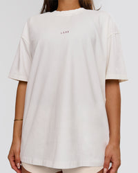 Woman wearing Run Club Unisex Oversized Heavyweight FLXCotton Tee - Off White | Model:Bianca | Size:S | Thumbnail Index: 8