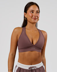 Woman wearing Stamina Sports Bra - Cocoa Powder | Model:Bianca | Size:S | Thumbnail Index: 3