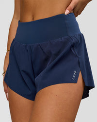 Woman wearing Tia-Clair Toomey-Orr Accelerate 3" Storage Running Short - Future Navy | Model:Bianca | Size:S | Thumbnail Index: 1