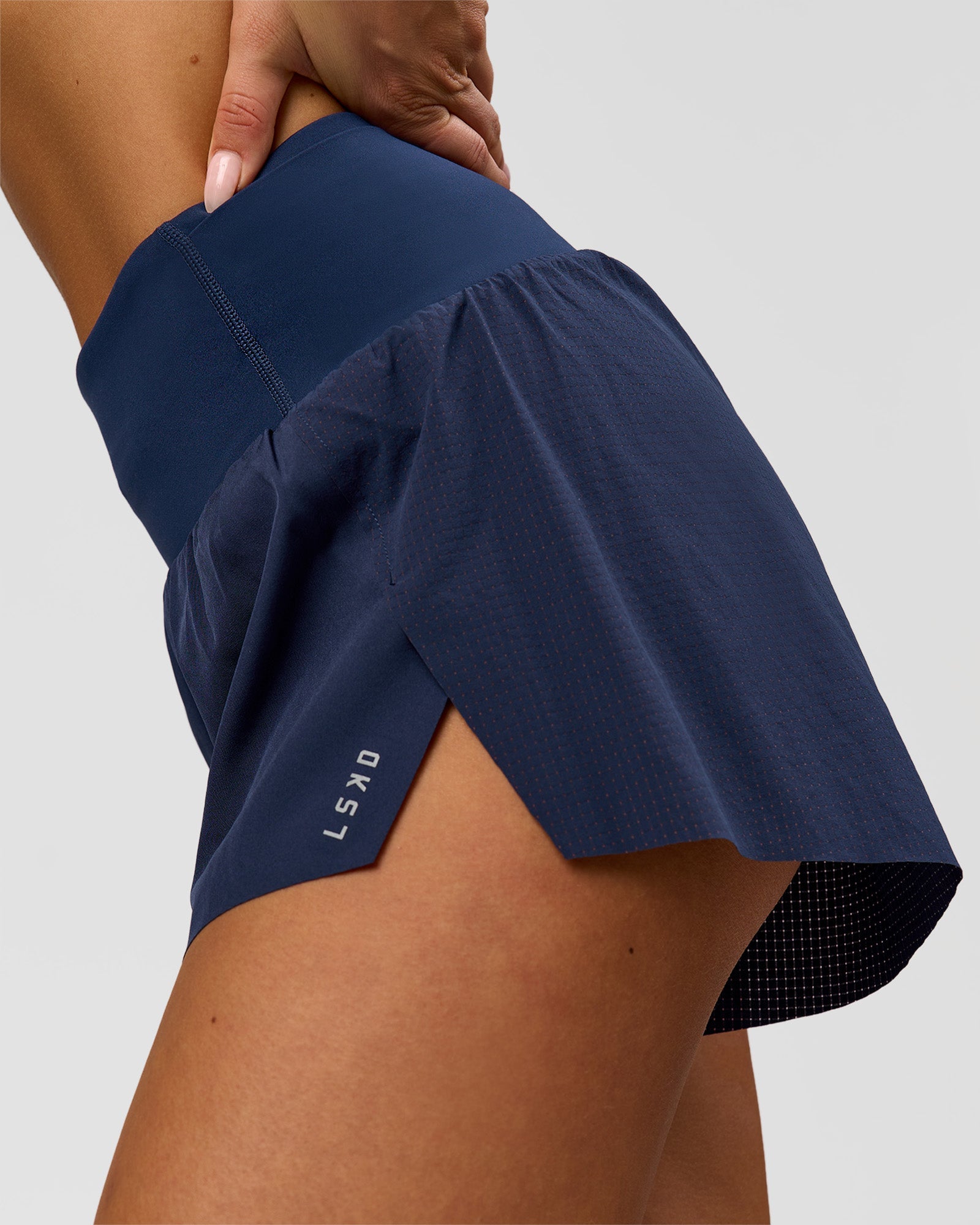 Woman wearing Tia-Clair Toomey-Orr Accelerate 3" Storage Running Short - Future Navy | Model:Bianca | Size:S