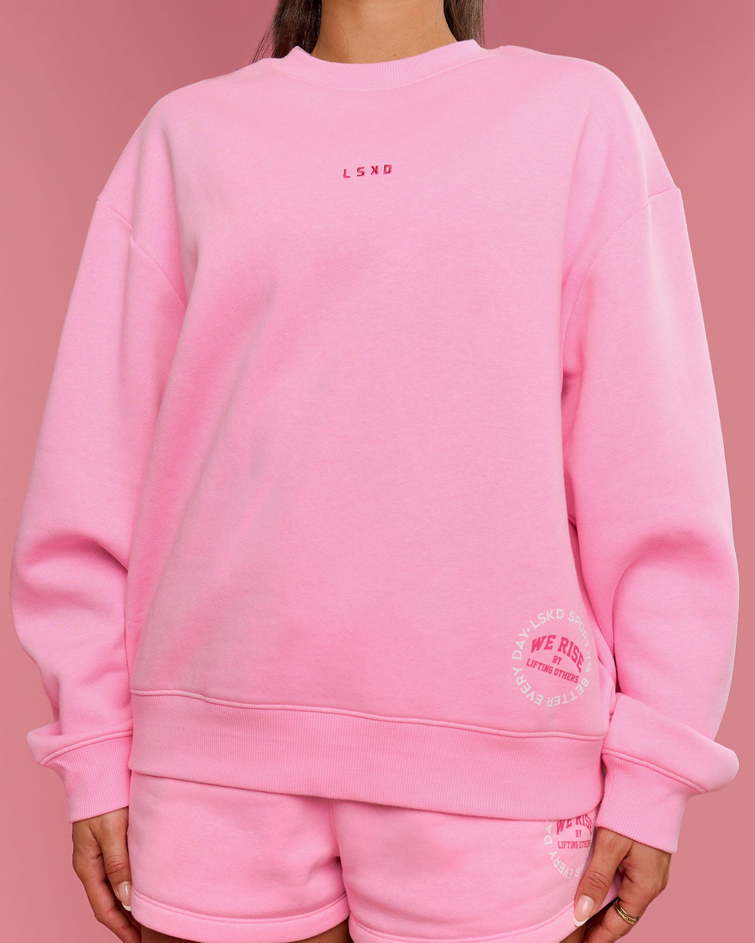 Woman wearing We Rise Oversized Sweater - Pink Rose-We Rise | Model:Bianca | Size:S - view 3