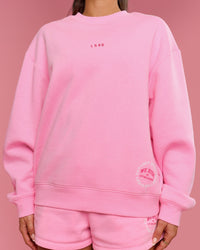 Woman wearing We Rise Oversized Sweater - Pink Rose-We Rise | Model:Bianca | Size:S | Thumbnail Index: 2
