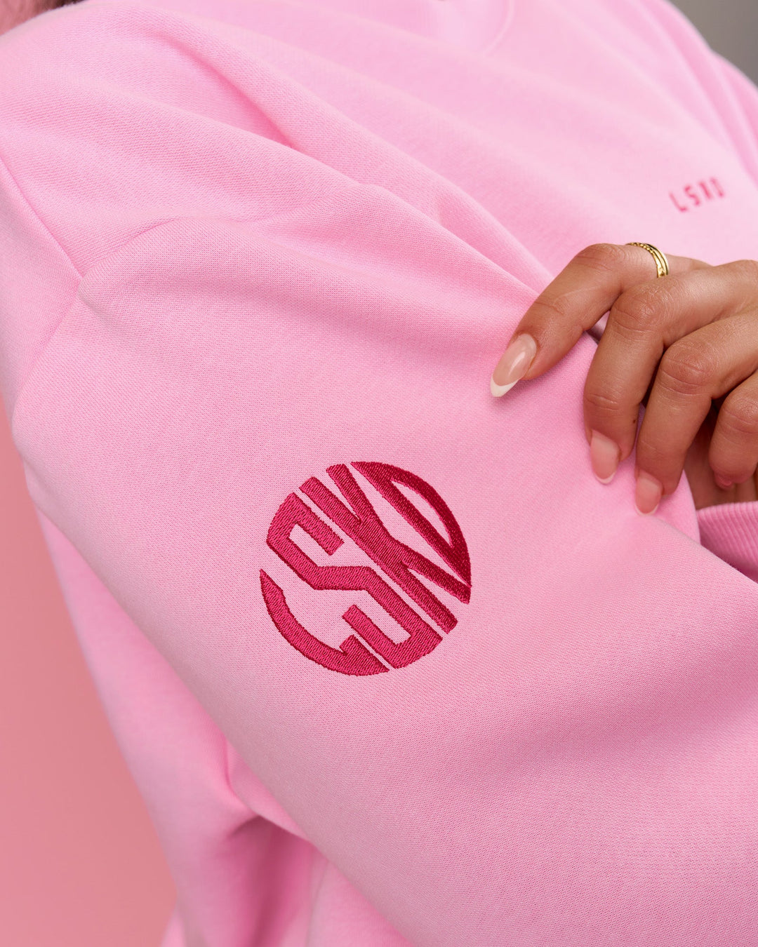 Woman wearing We Rise Oversized Sweater - Pink Rose-We Rise | Model:Bianca | Size:S - view 4