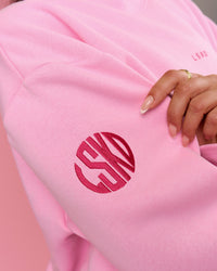 Woman wearing We Rise Oversized Sweater - Pink Rose-We Rise | Model:Bianca | Size:S | Thumbnail Index: 3