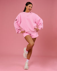 Woman wearing We Rise Oversized Sweater - Pink Rose-We Rise | Model:Bianca | Size:S | Thumbnail Index: 9